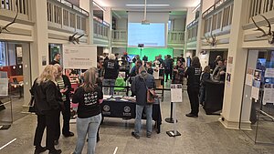 [Translate to English:] people gathered at mini-expo