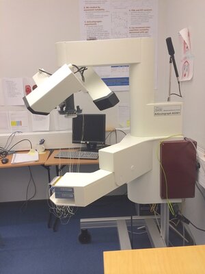 the electromagnetic articulograph model 501 standing in a lab studio