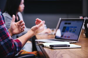 A person gesturing in a conversation