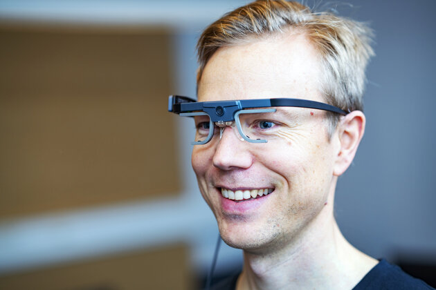 male head with portable eya tracking glasses